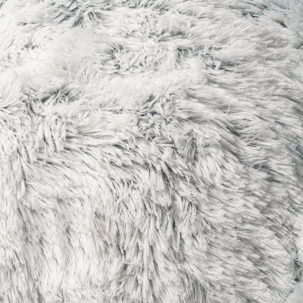 Close-up of snowflake white two-tone plush pet bed shag fabric