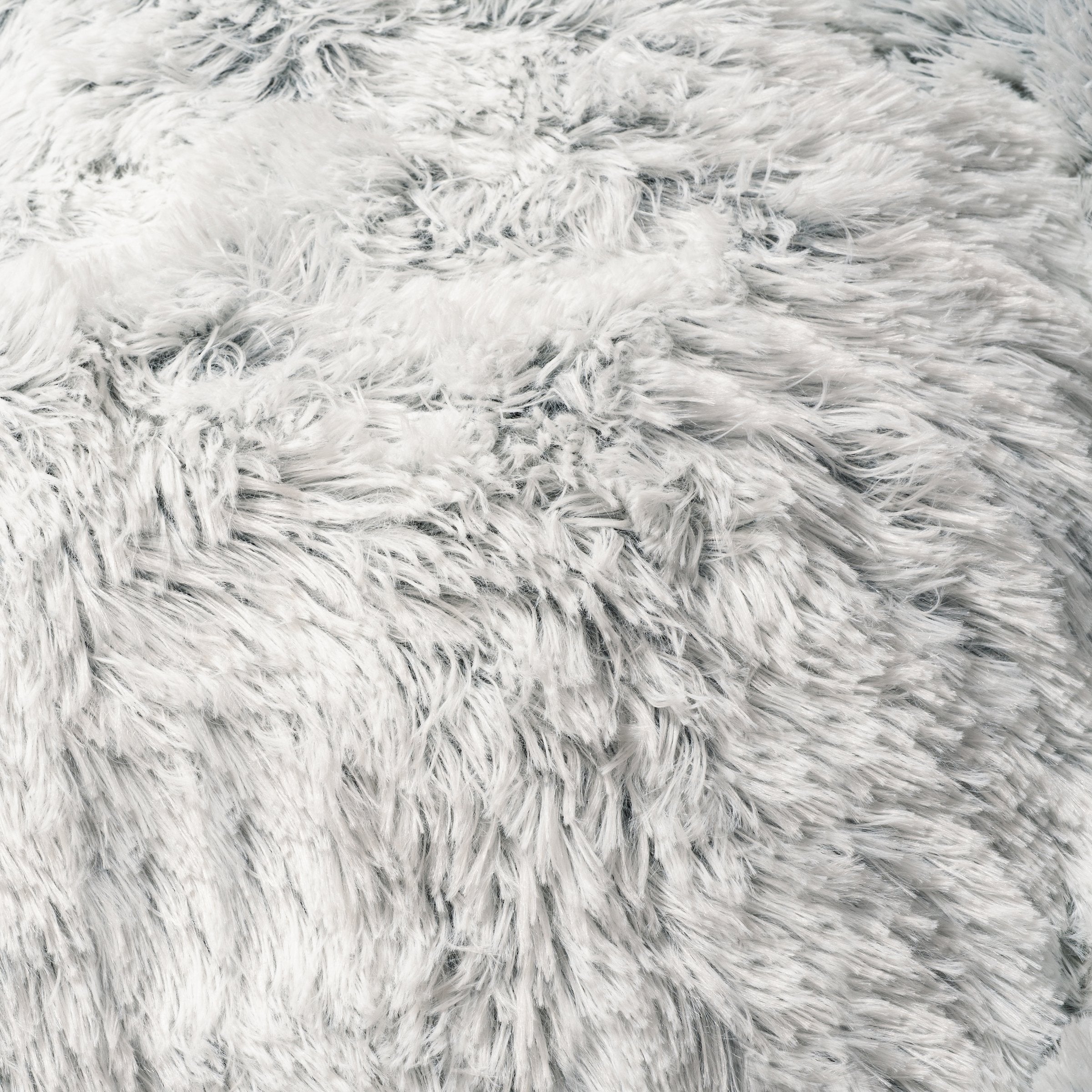 Snowflake white two-tone plush pet bed, shaggy textured surface