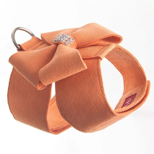 Orange plush dog harness with rhinestone bow and metal leash ring