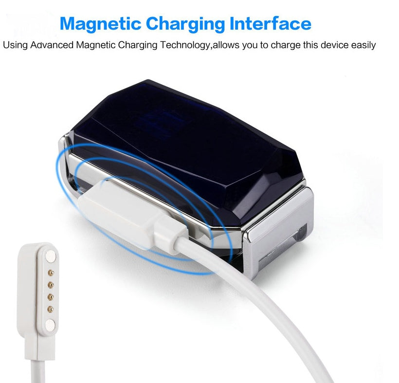 Magnetic charging interface on black GPS tracker device with charging cable