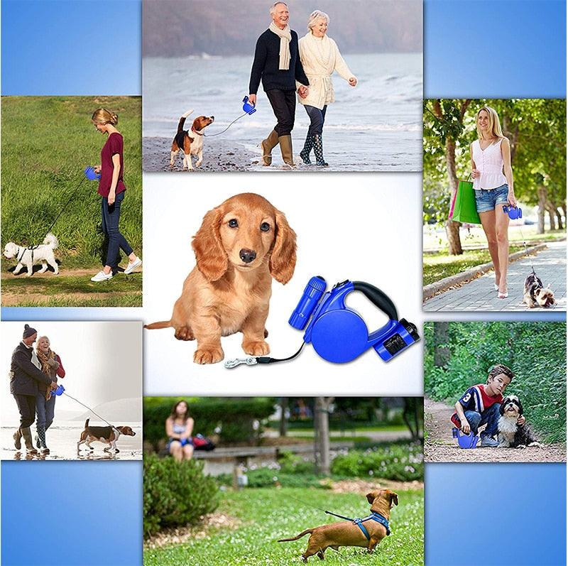 Blue retractable dog leash with LED light and waste bag dispenser for walks