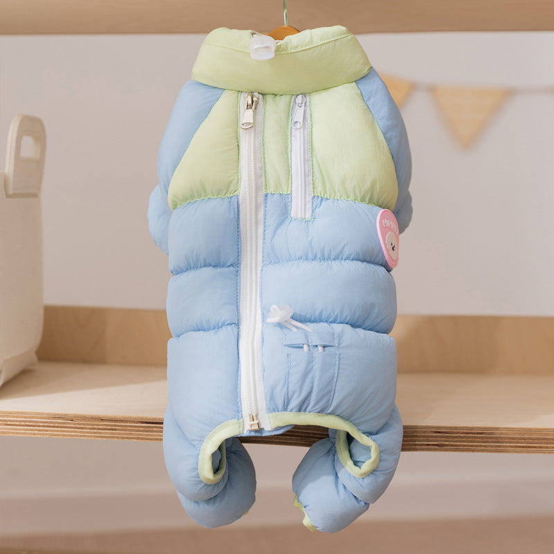 Color-block puffer dog jumpsuit in light blue with green accents, full front view with zipper