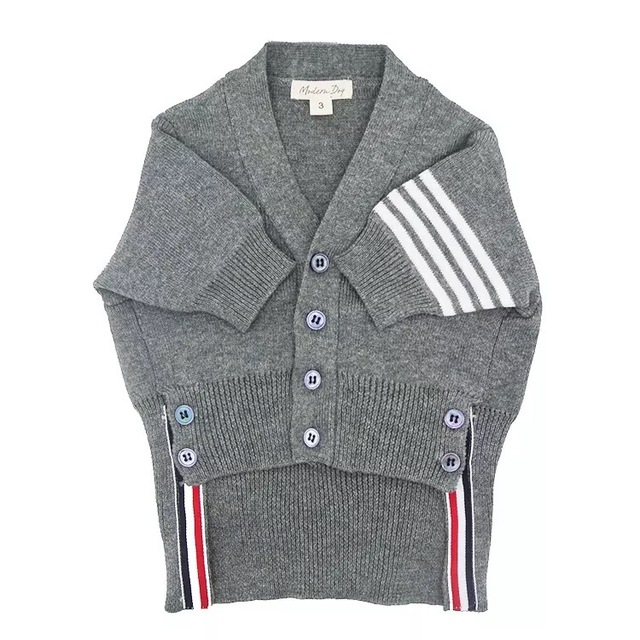Grey knit cardigan sweater with front buttons and white-and-red striped side panels