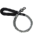 Dog rope leash with padded black handle and looped gray bungee line, metal ring