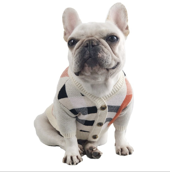 Cream dog sweater with black and red plaid, V-neck style and wooden-look button closures
