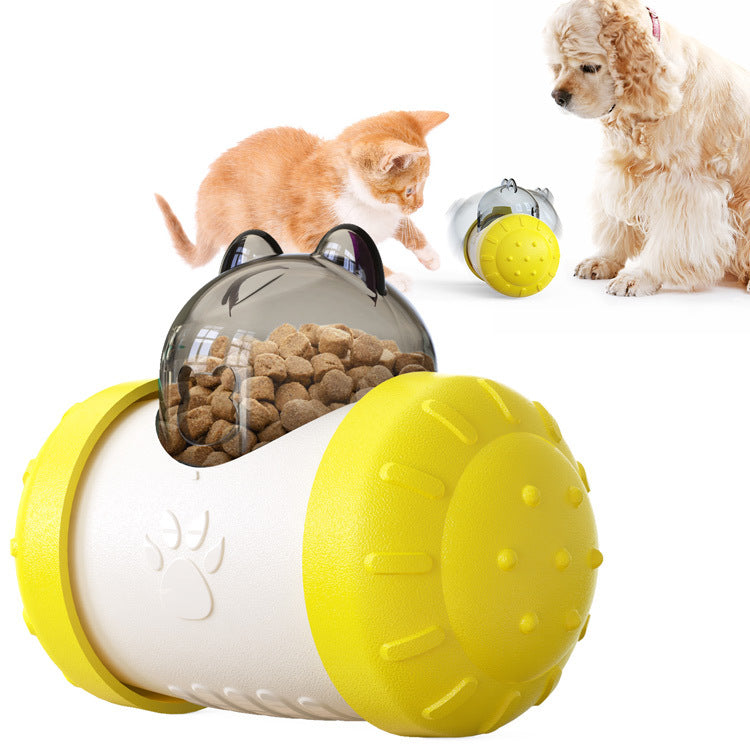 Interactive treat-dispensing wheel toy with clear top and yellow-and-white ball body