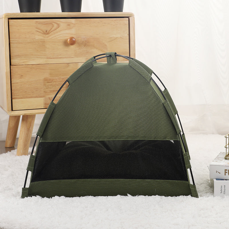 Green pet tent with arched entrance and black lower panel, padded floor