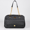 Black quilted pet duffel bag with gold chain handles and front flap pocket