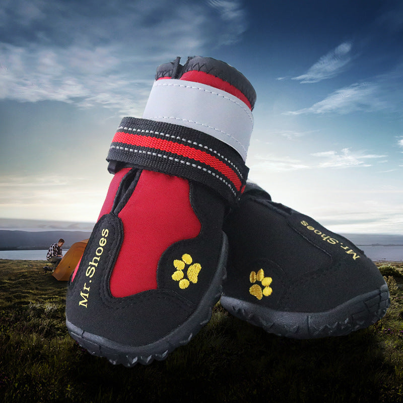 Waterproof shoes for medium-to-large dogs, black with red panels and yellow paw emblems