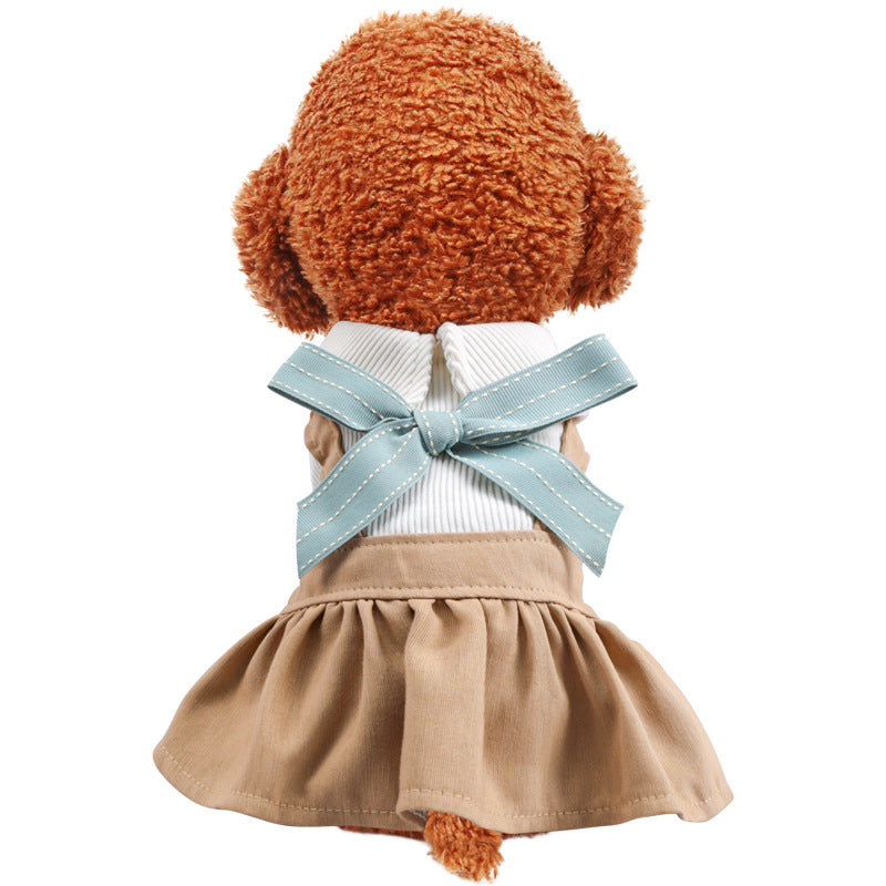 Dog and cat dress: light-blue bow, khaki skirt, white ribbed collar