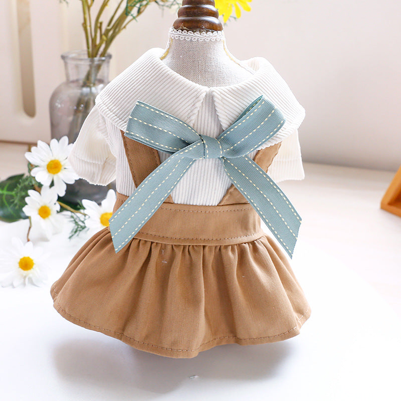 Dog and cat dress: white knit back, khaki skirt, light-blue neck bow