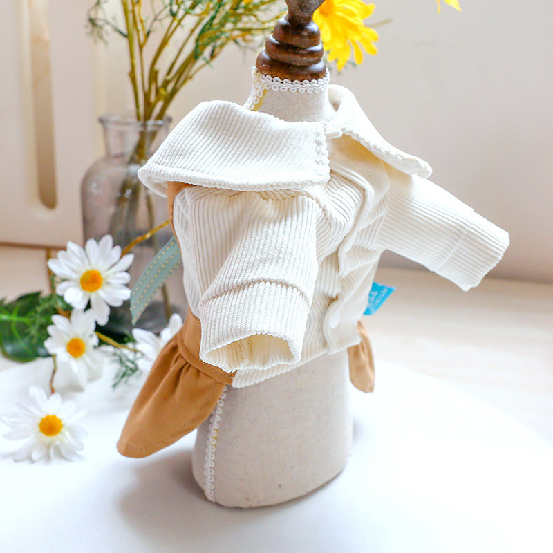 Dog and cat dress with white knit top and khaki skirt, ruffled sleeves