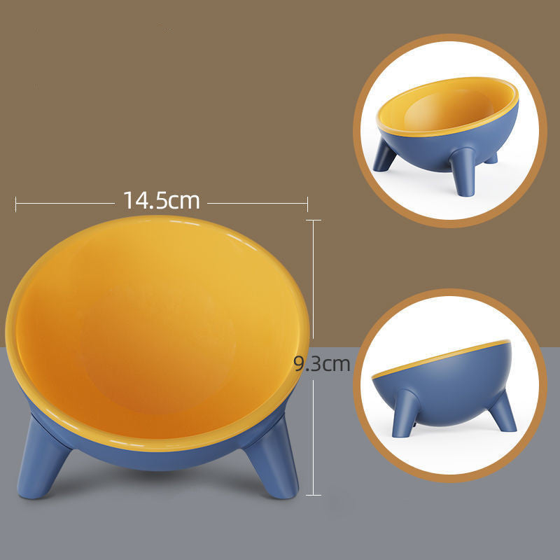 Yellow pet feeding bowl with blue legs and shallow raised stand