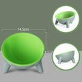 Green pet feeding bowl with blue legs and shallow raised stand
