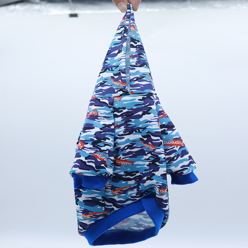 Blue camouflage pet hoodie with hood and logo print, front panel and side view.