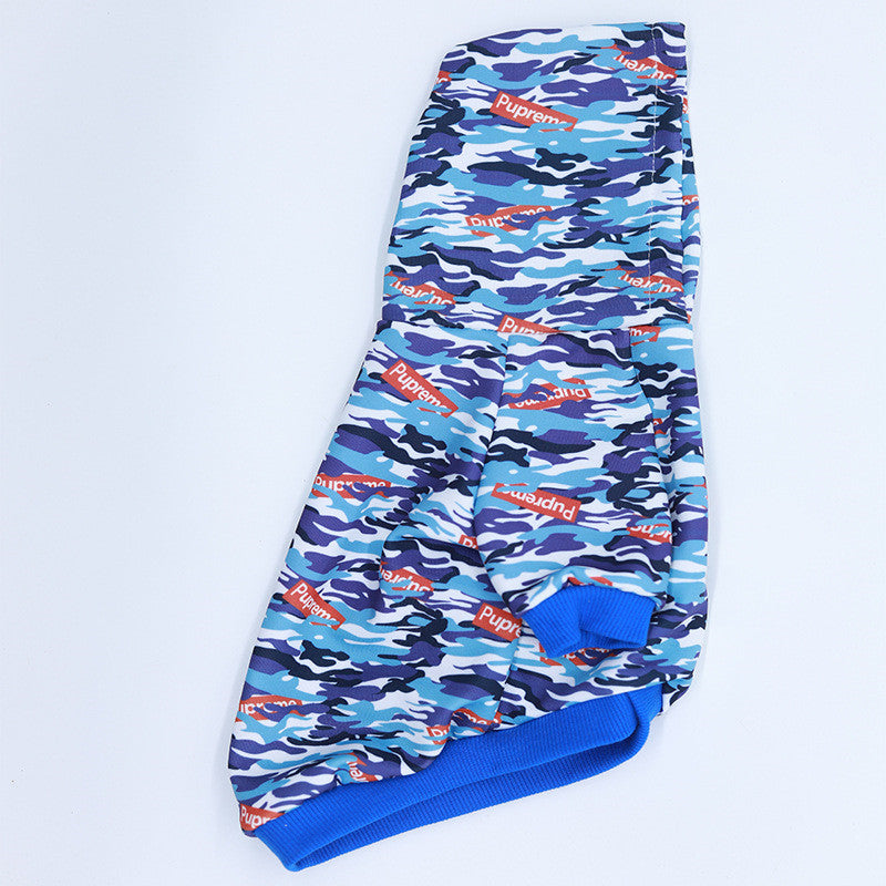 Blue camouflage pet hoodie with hood, logo print and blue ribbed cuffs, side view.