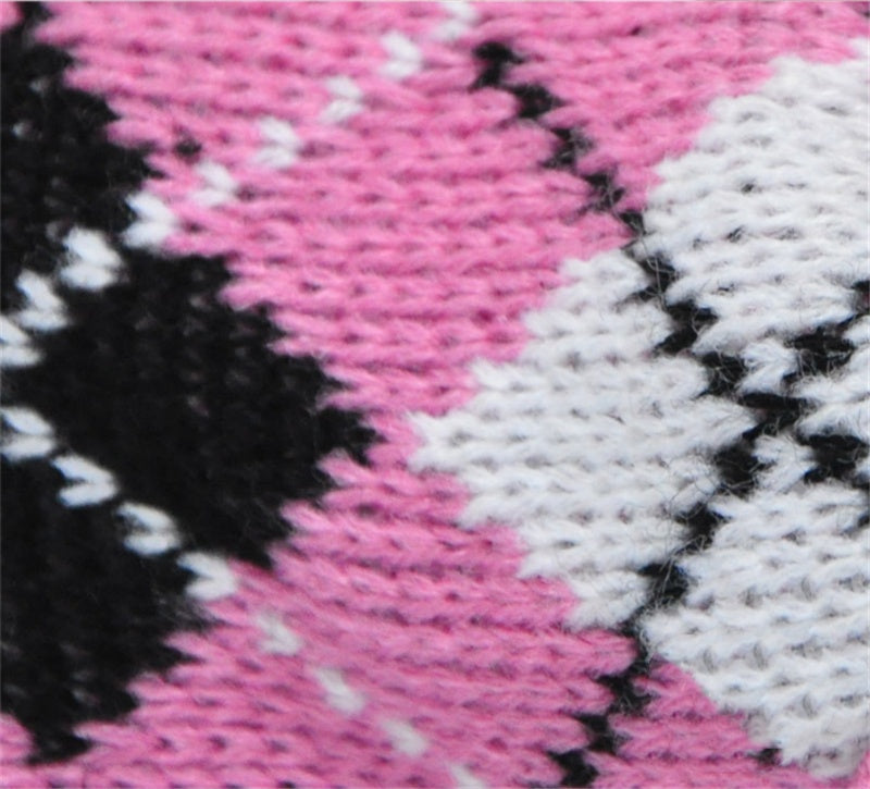 Pink, white, and black striped knit pet sweater fabric close-up