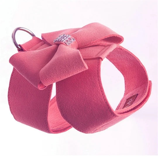 Pink plush dog harness with rhinestone bow and metal leash ring