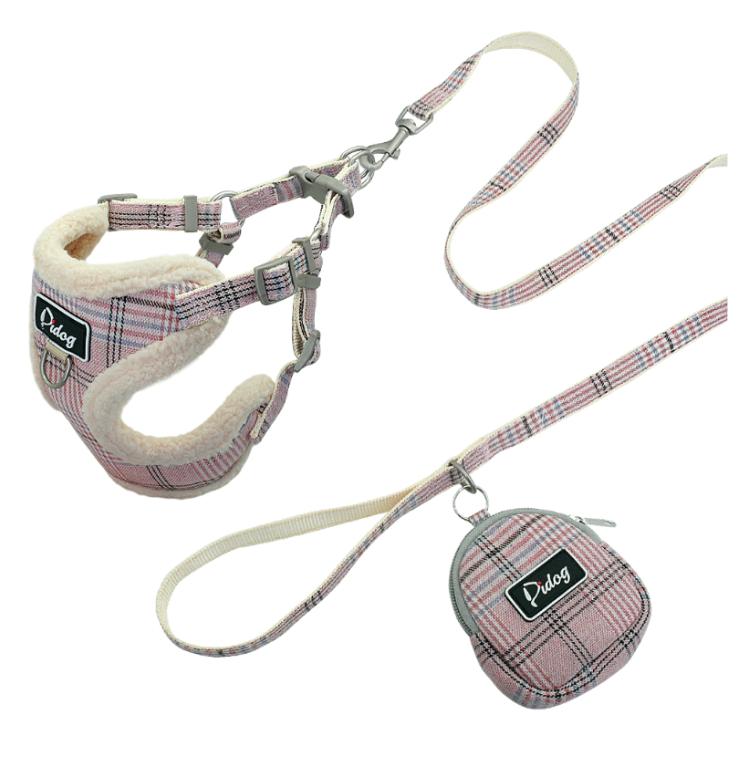 Plaid plush dog harness with matching leash and round zippered storage pouch accessory.