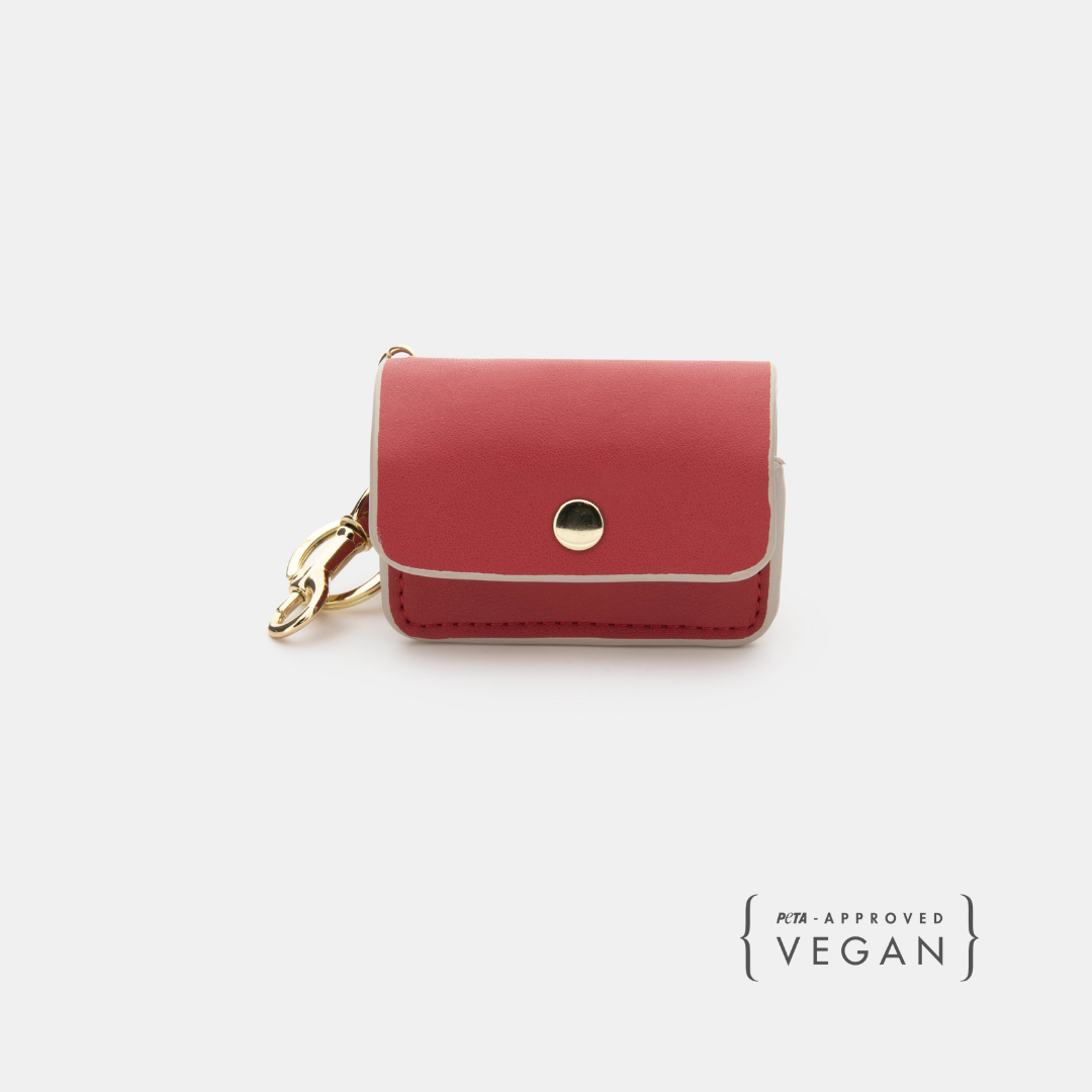 Red vegan leather waste bag holder with snap flap front and gold keyring clip