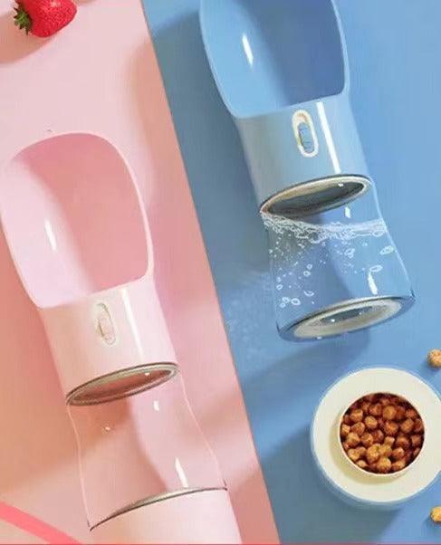 Two 2-in-1 portable pet feeders, blue and pink, showing flip-top bowls and compartments