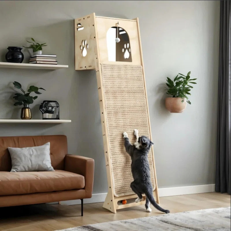 Dark gray tabby reaching up a light wood cat tower with scratching ramp surface
