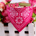 Pink pet bandana with white paisley pattern and snap collar