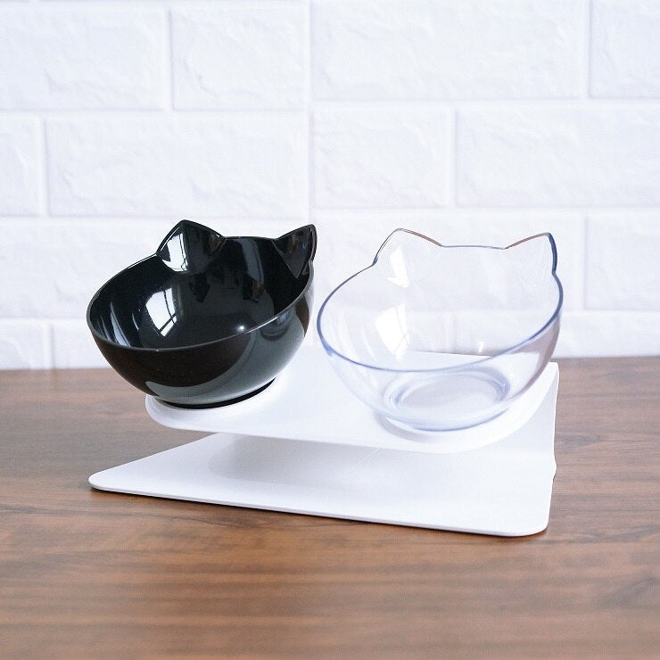 Double raised cat bowls with black bowl and clear bowl on white base