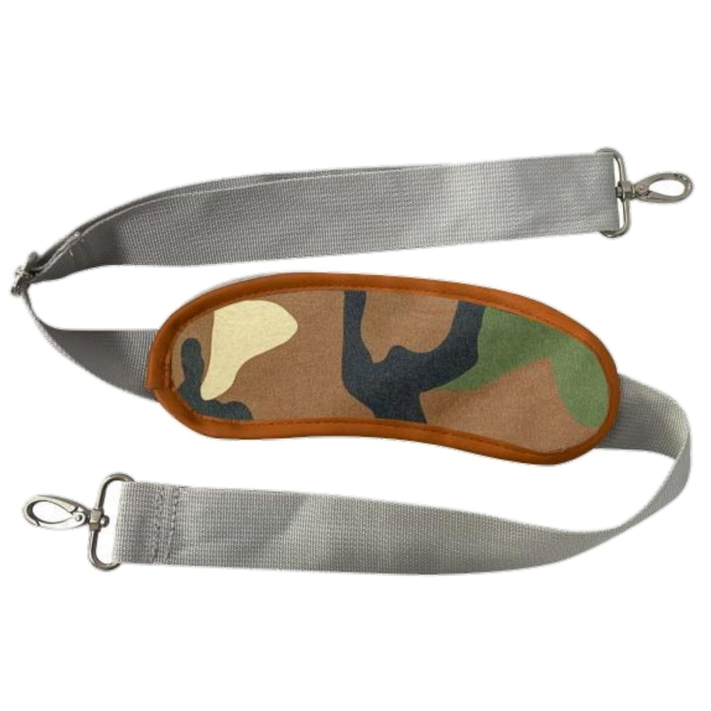 Adjustable shoulder strap with camo fabric trim for pet carrier.