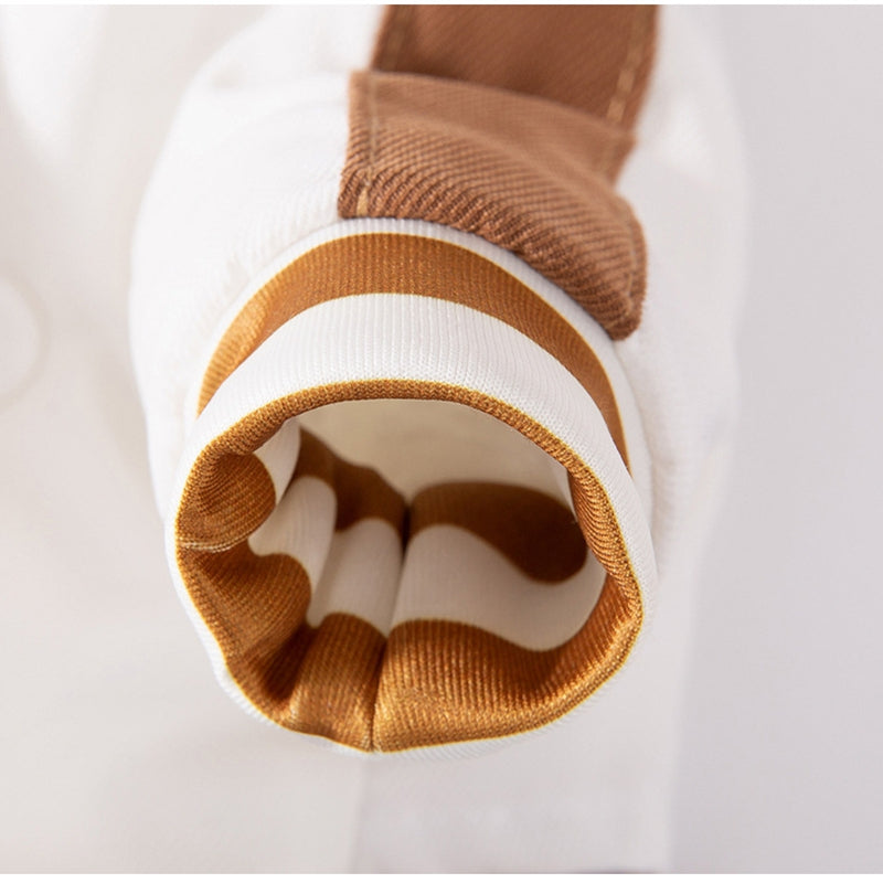 Pet jacket collar detail with tan/gold and white striped loop opening