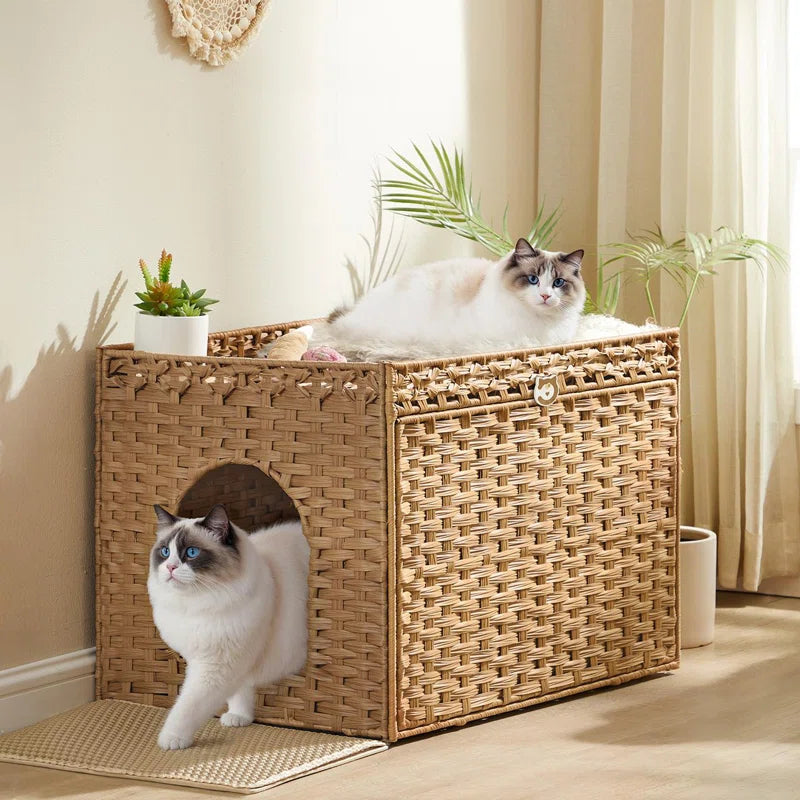 Warm tan wicker-style cat litter box with arched entry cutout and washable floor mat