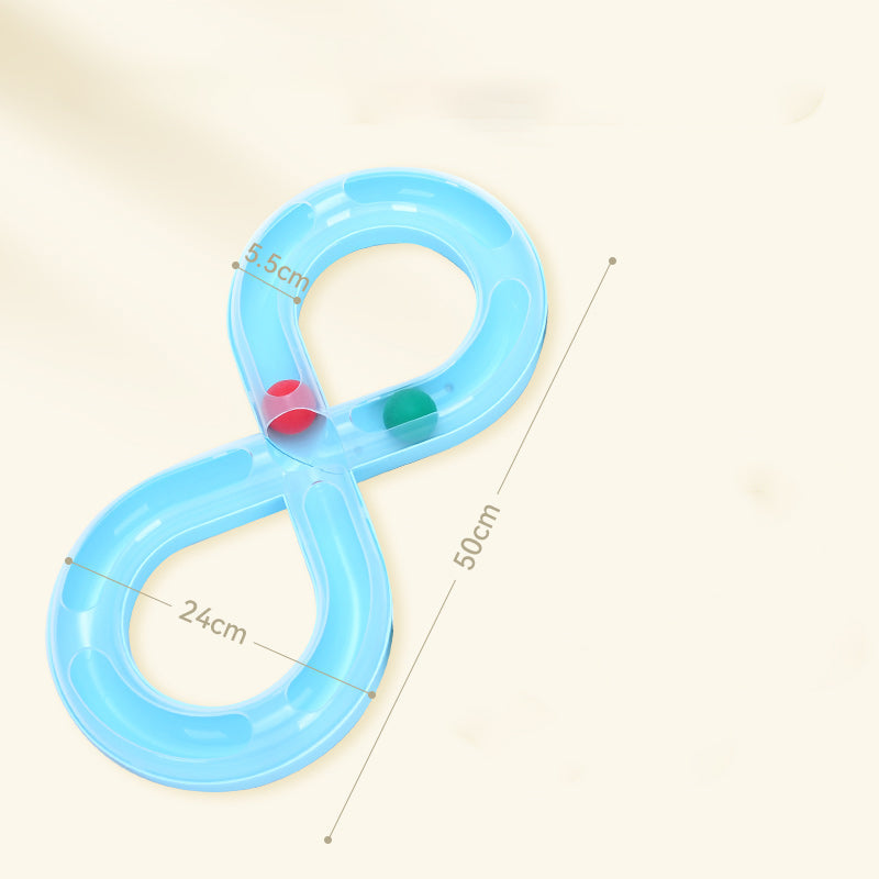 Blue cat turntable track toy with red and teal balls, with size markers