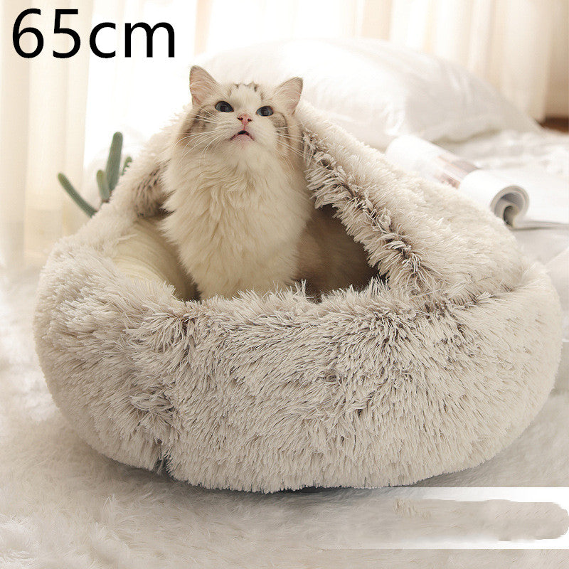 Beige round shag plush pet bed with thick cushioned walls and open sleeping center