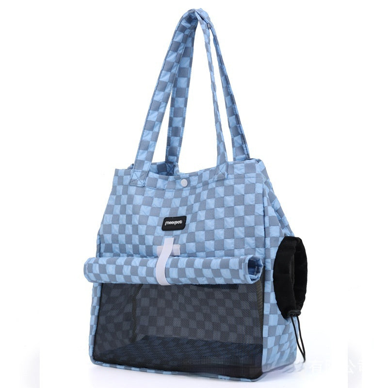 Blue check small portable cat shoulder bag with black bottom panel and side pocket.