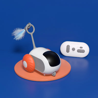 Interactive cat toy car with orange ear, white remote controller, on orange base