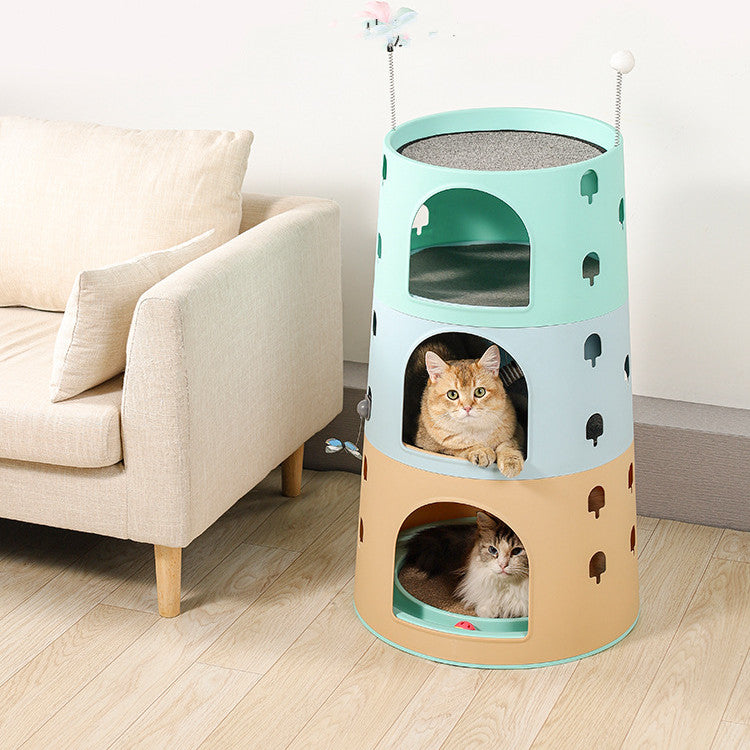 Cat multichamber cat tower with three arched levels, mint and beige; kitten inside