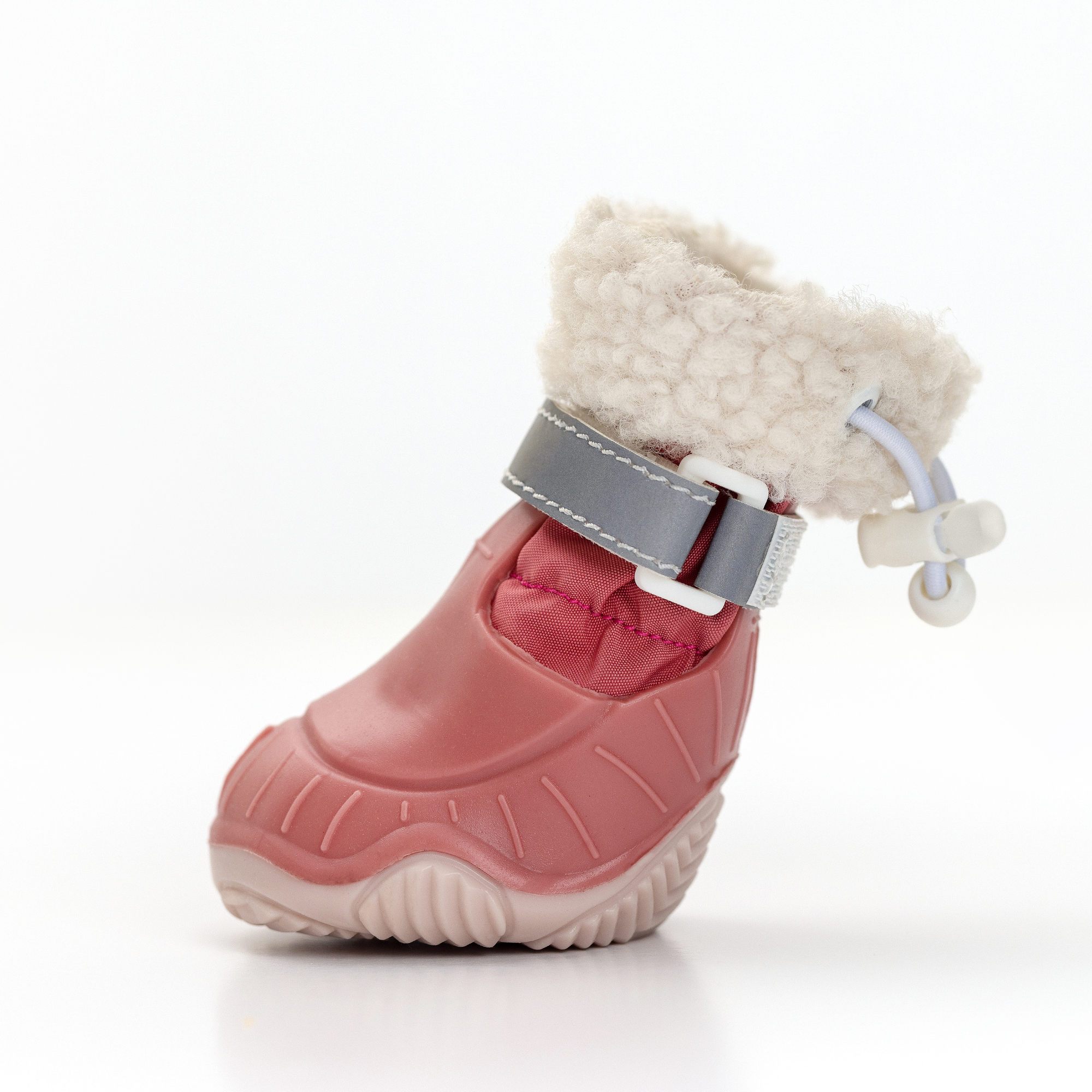 Pink dog snow boot with faux-fur cuff, gray strap, and grippy sole
