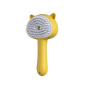 Yellow cat grooming slicker brush with gray pin bristles and curved handle