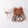 Brown bear puppy dress with plaid skirt and white fuzzy collar, tied bow