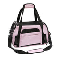 Pink soft pet carrier bag with mesh side panel and top handle, crossbody strap