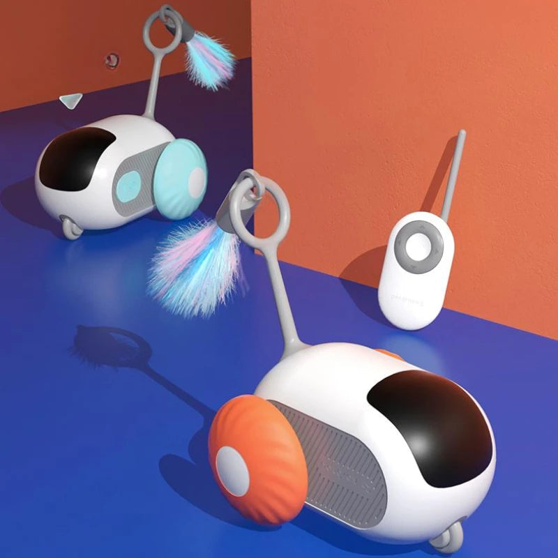 White remote-control cat car toy with orange bumper and rainbow brush, plus small remote