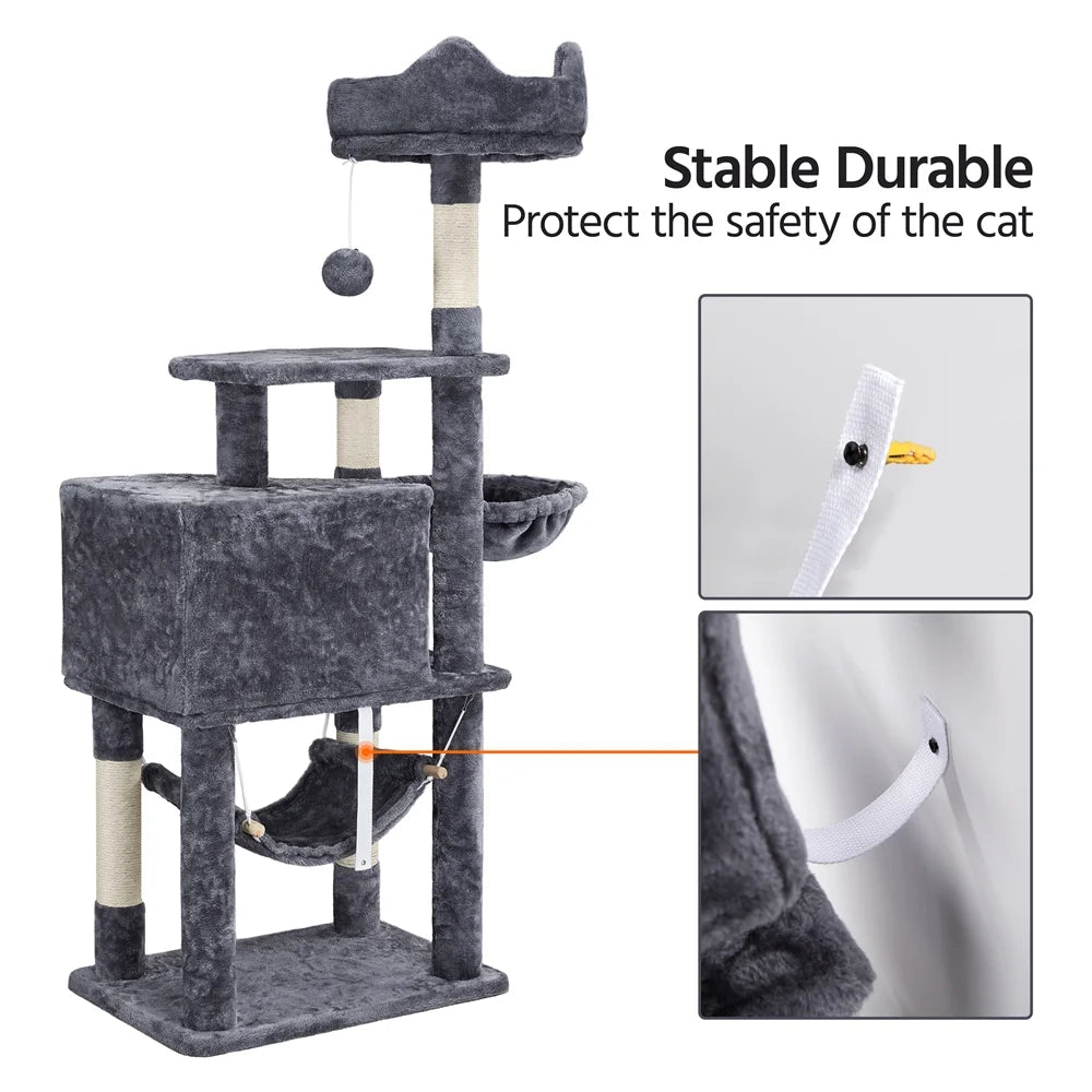 Dark gray cat tree tower showing stable posts, enclosed cubby, and hanging toy