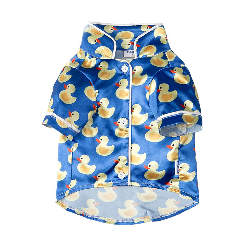 Blue duck-print pet jacket with button front and white trim details