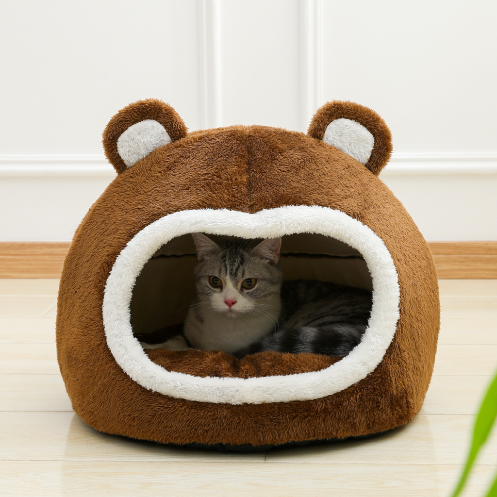 Brown bear-shaped cat bed house with white-edged oval entrance and plush ears