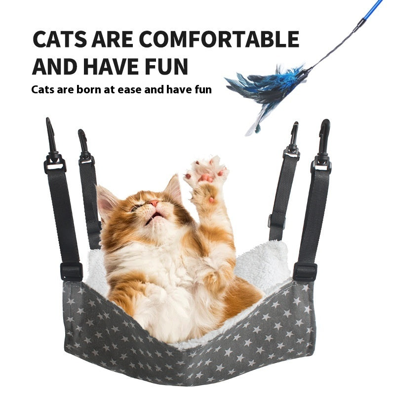 Cat cage hanging hammock bed with dark star print fabric and white plush lining, black straps