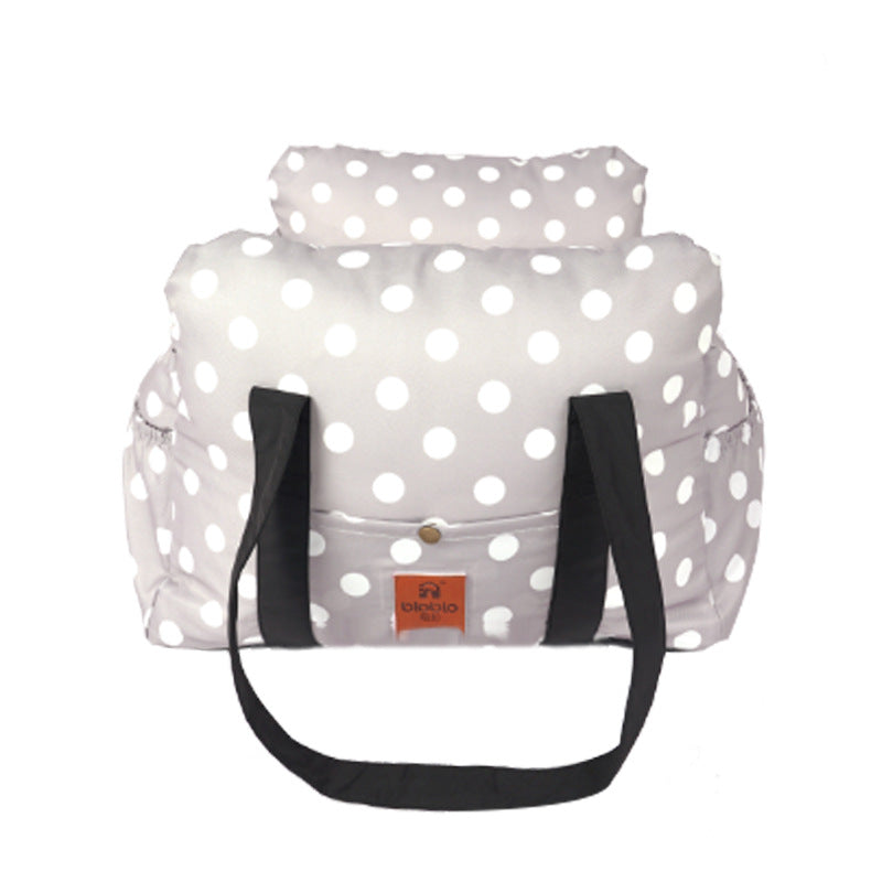 White polka-dot pet safety car carrier with black side straps