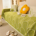 Pet sofa cover in green with white arch-line pattern and fringed edge