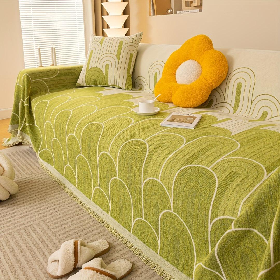 Pet sofa cover in green with white arch-line pattern and fringed edge