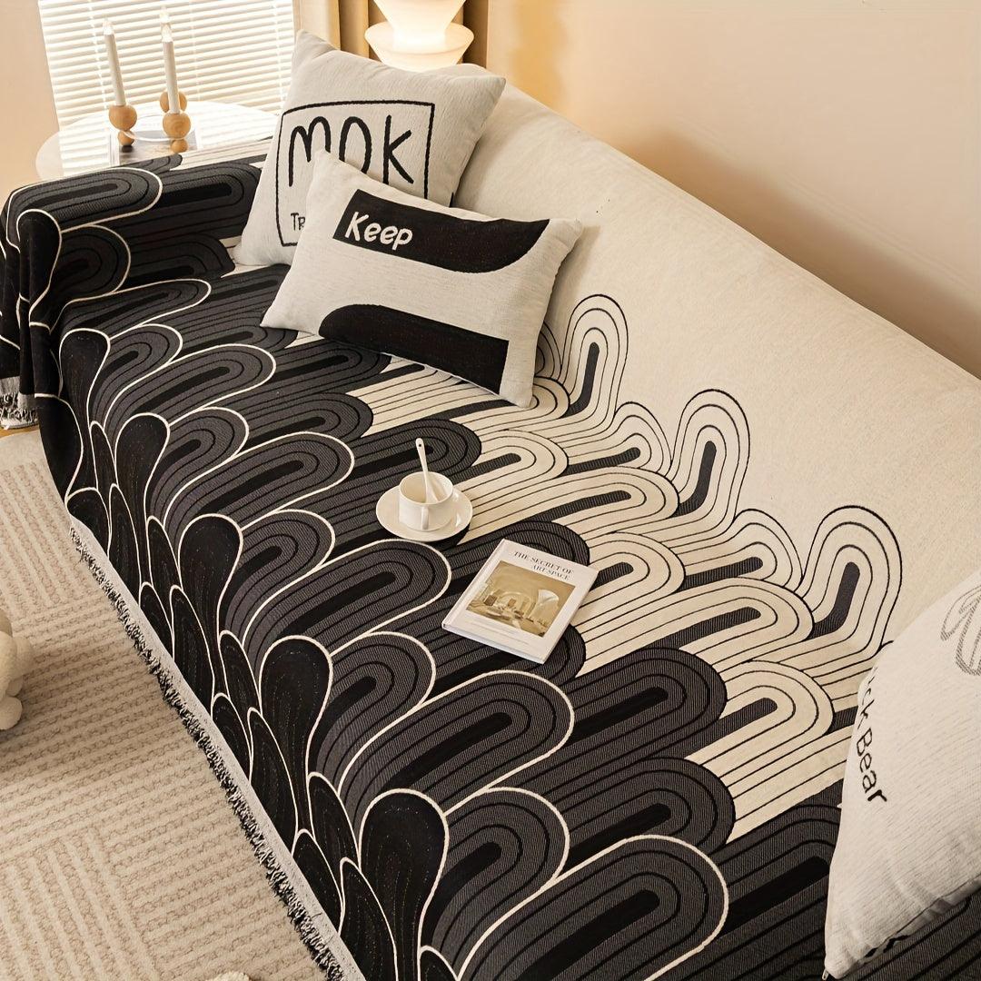 Pet sofa cover in black with beige arch-line pattern and fringed edge