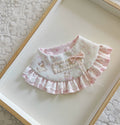 Pink lace-trimmed scarf with satin bow and ruffled edge, teddy bear pattern